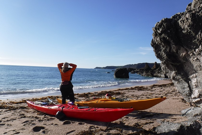 Sea kayaks on beach