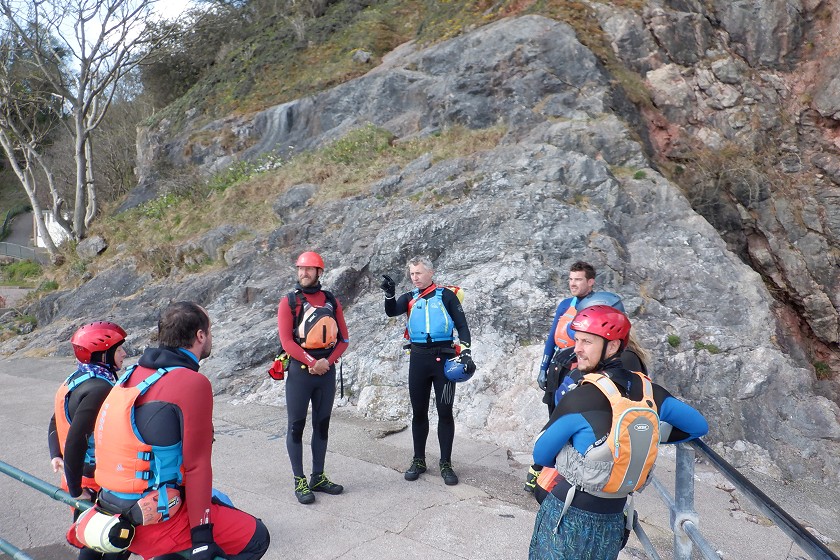 Group chatting on the rocks